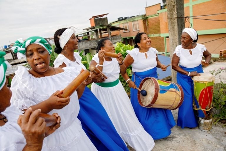 Figure 4. Colombian community preserving Afro-Colombian culture through song. Source: Flickr, UN Women/Ryan Brown.