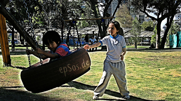Latino children playing