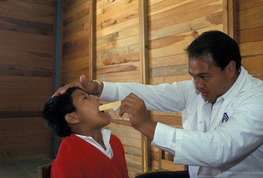 doctor treating a child in mexico